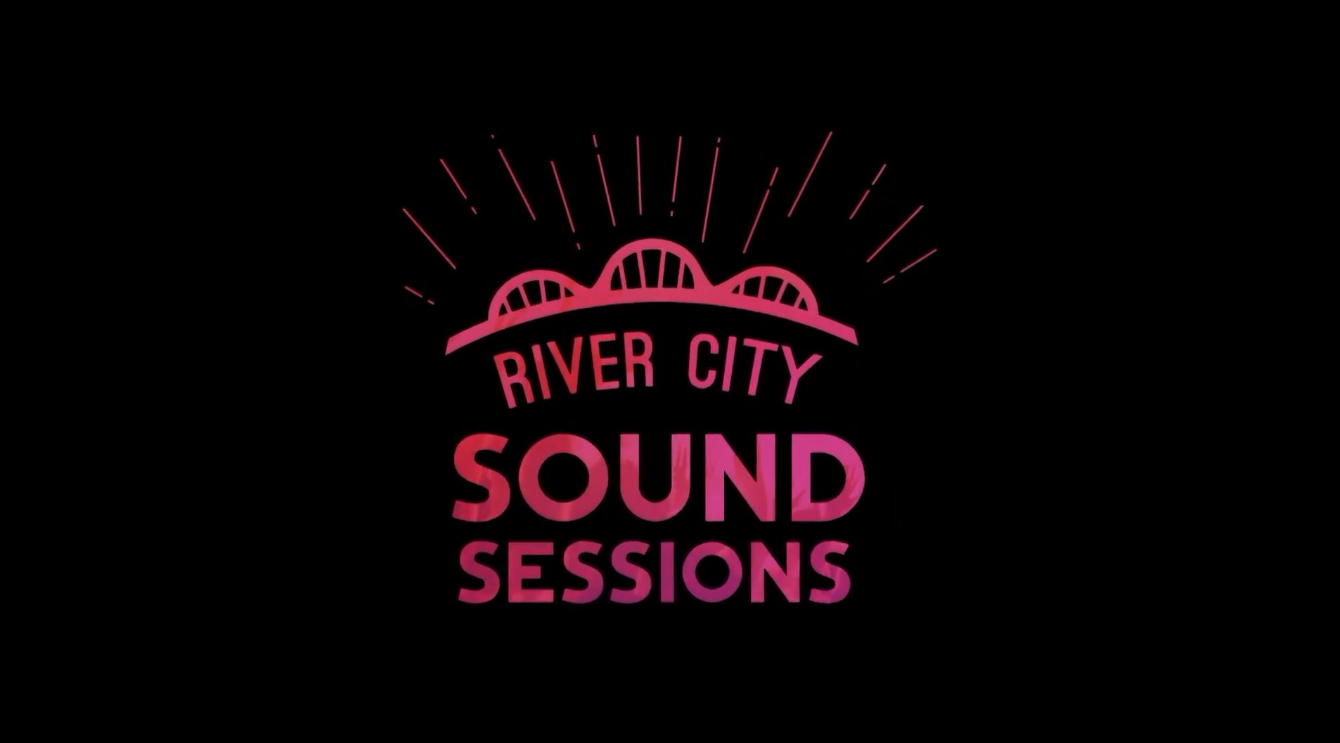 Title card from River City Sound Sessions Vol. 7. The series’ pink and magenta bridge logo glowing against a black background.